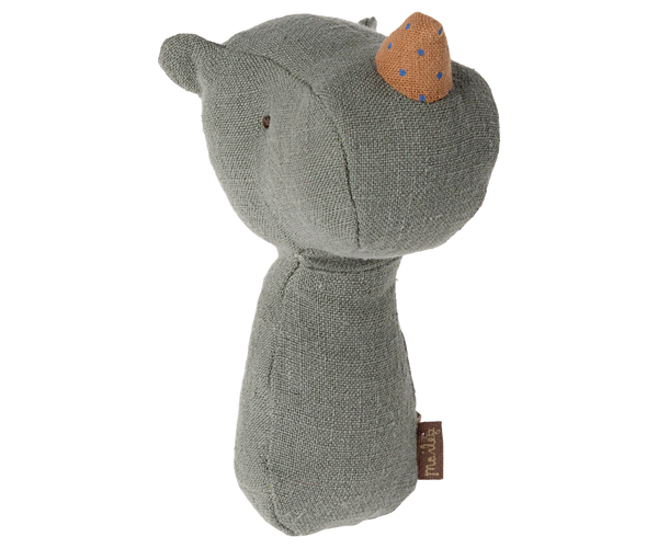 Grey rhino rattle with a brown horn on a white background