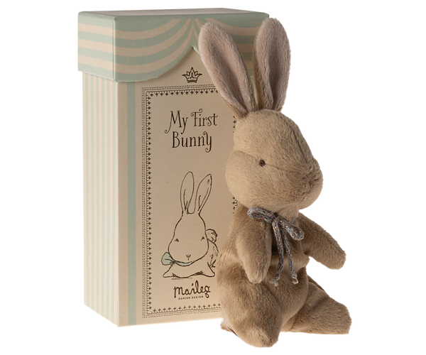 Stuffed bunny toy with 'My First Bunny' packaging on a white background