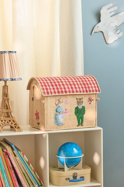 Small Nathalie Lété Raffia Play & Toy Storage Basket in a child's bedroom