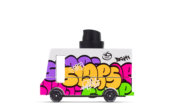 Colorful toy truck with graffiti-style design on a white background