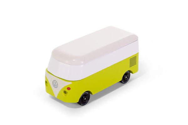Green and white model of a camper van on a white background