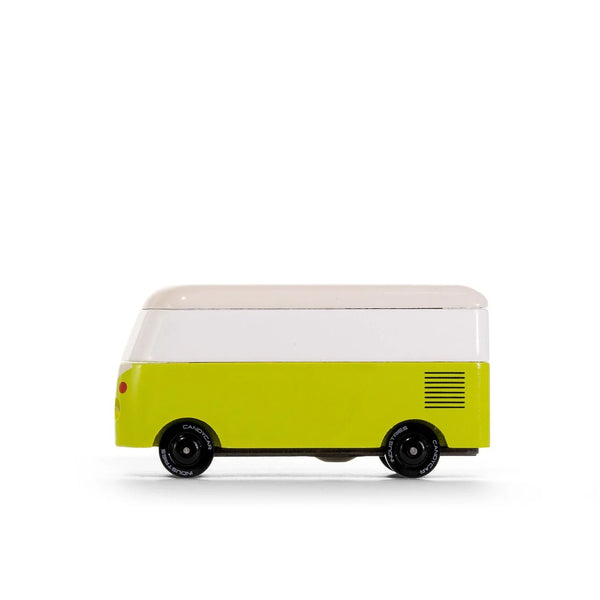 Small vehicle model with a white top and green body on a white background
