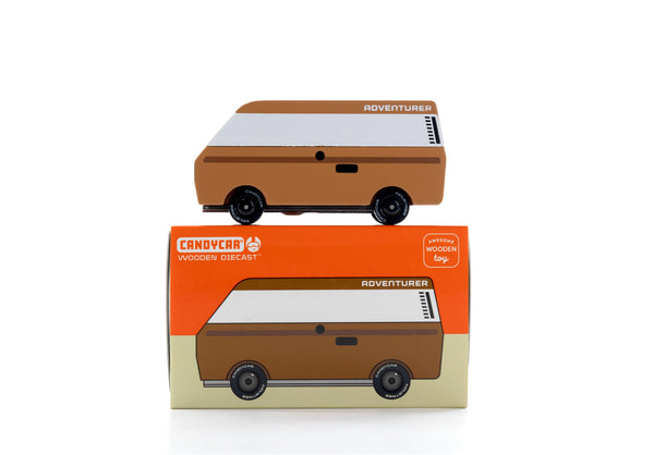 Model of a camper van with its packaging on a white background
