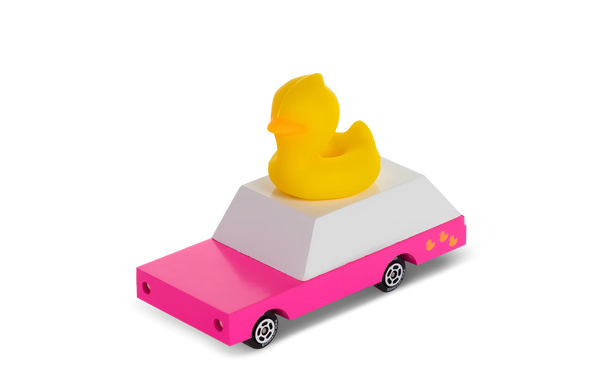 Pink toy car with a yellow rubber duck on top against a white background