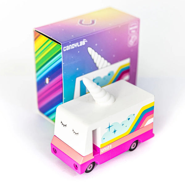 Unicorn-shaped truck with rainbow design on a white background