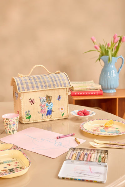 Nathalie Lété Theme Kids Raffia Bag by Rice DK on a kitchen table