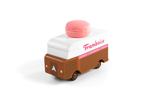 Toy van with a pink top labeled 'Framboise' on a white background