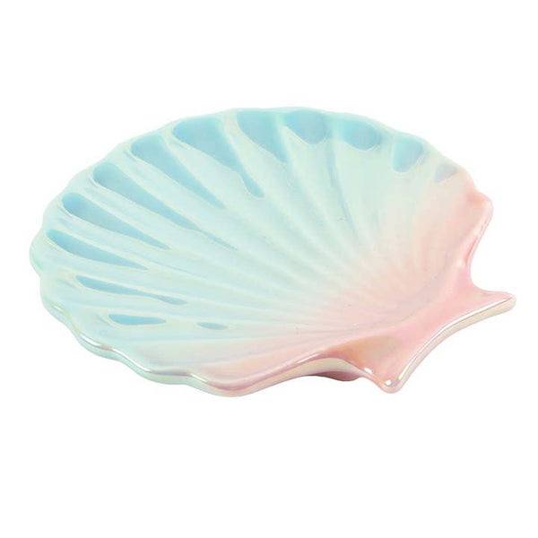 Shell-shaped dish with a pastel gradient on a white background