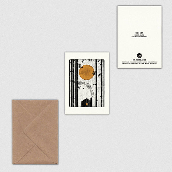 Front and back of artistic greeting card with a brown circle and black lines on a white wall, accompanied by a brown envelope.