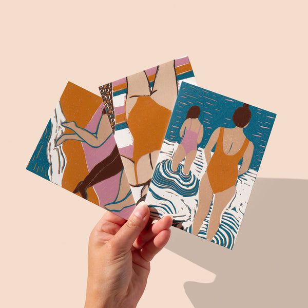 Three illustrated cards featuring women in swimsuits on a beige background