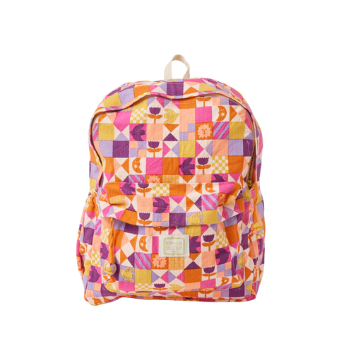 Colourful geometric patterned backpack on a white background