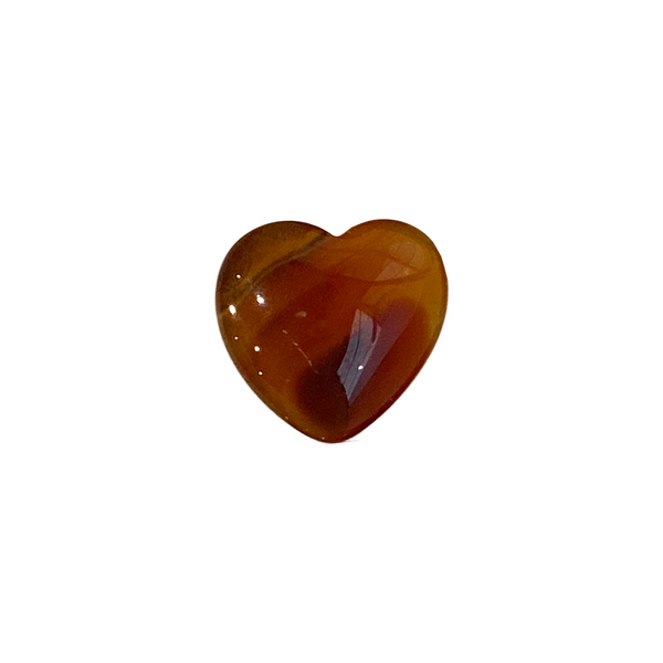 Carnelian heart-shaped gemstone on a white background