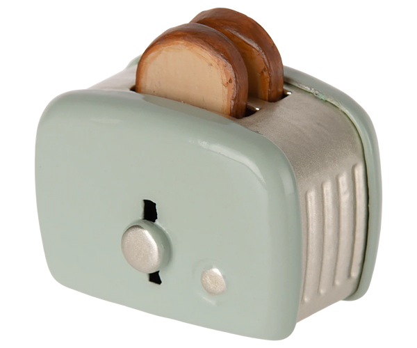 Small toaster with two slices of bread on a white background