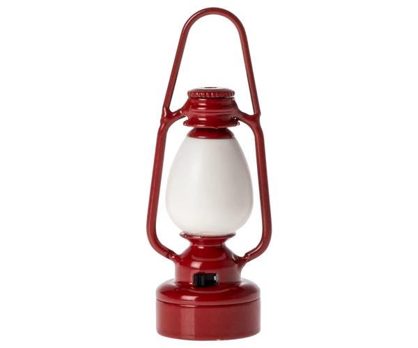 Red miniature toy lantern on a white background