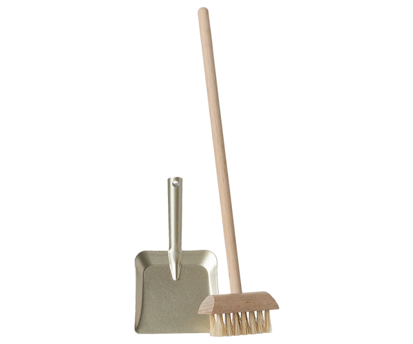 Toy cleaning tools including a broom and dustpan on a white background