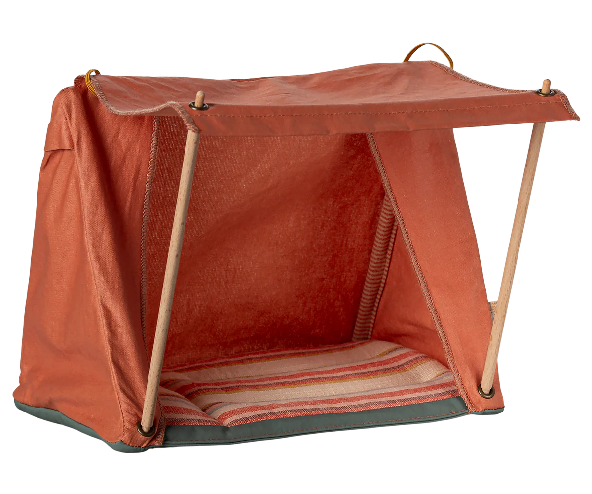 Red pet tent with wooden frame on a white background