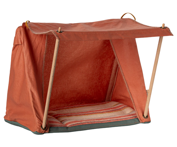 Red pet tent with wooden frame on a white background