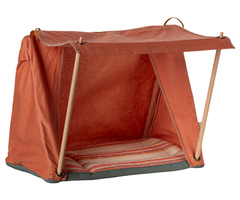 Red pet tent with wooden frame on a white background