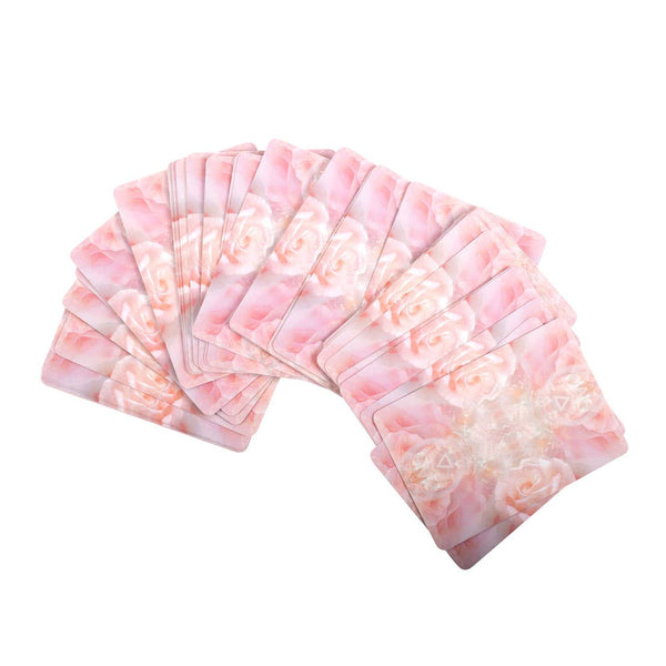 Set of pink and white floral cards on a white background