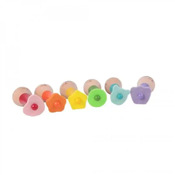 Colourful baby maracas on a white background