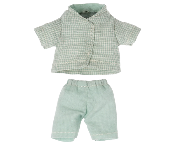 Green checkered shirt and pants set on a white background