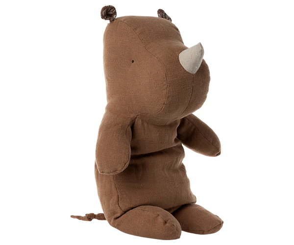 Brown plush rhino toy with a neutral background