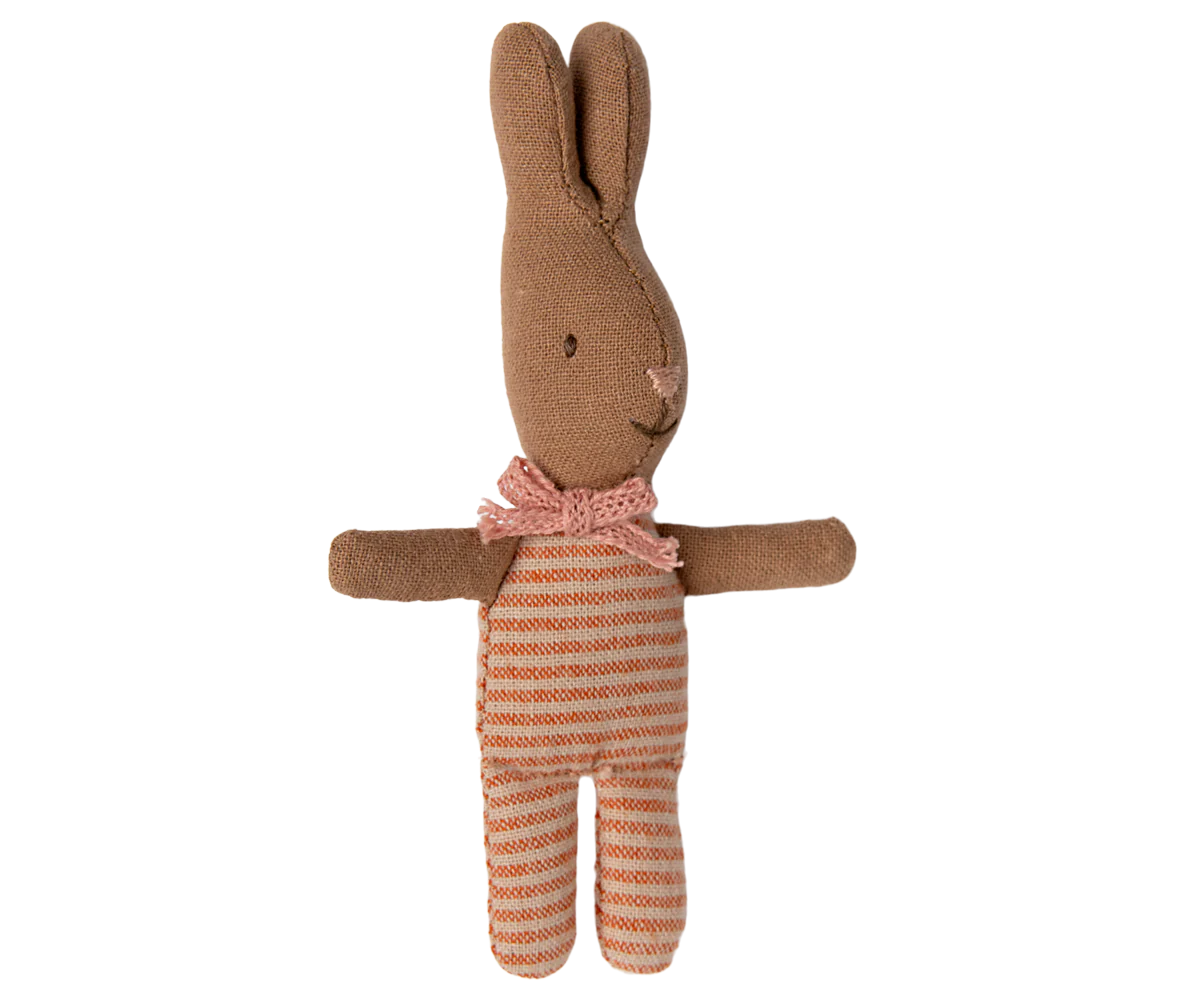 Stuffed rabbit toy with a striped body on a white background