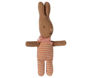 Stuffed rabbit toy with a striped body on a white background