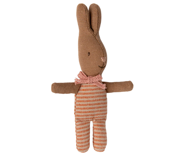 Stuffed rabbit toy with a striped body on a white background