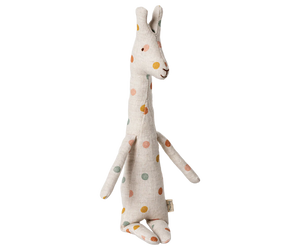 Stuffed giraffe toy with colorful spots on a white background
