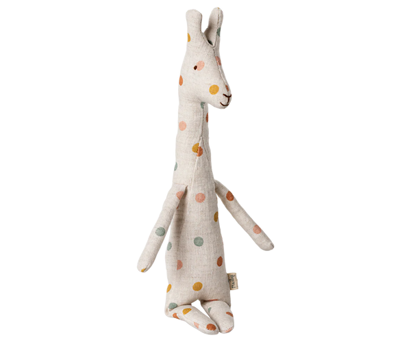 Stuffed giraffe toy with colorful spots on a white background