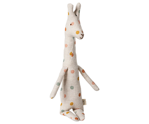 Stuffed giraffe toy with colorful spots on a white background