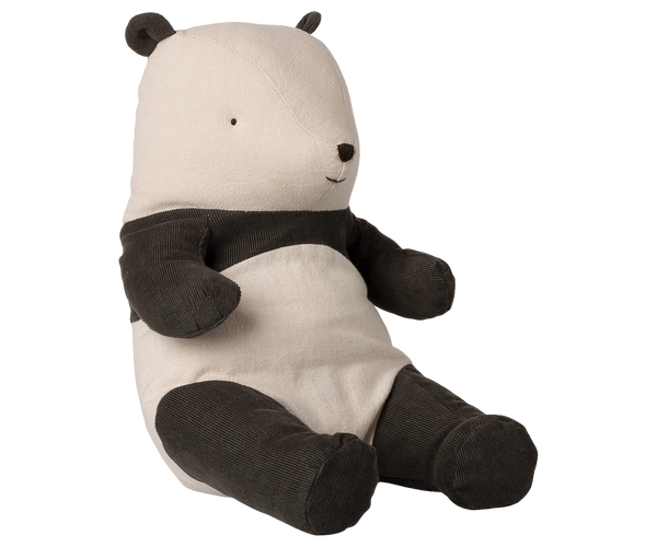 Stuffed panda toy on a white background