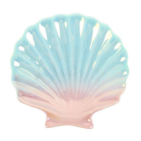 Iridescent shell-shaped dish on a white background