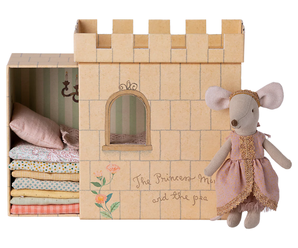 Wooden castle with a mouse princess doll in front