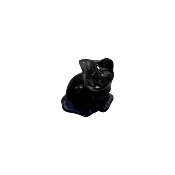 Black cat crystal figurine on a white background