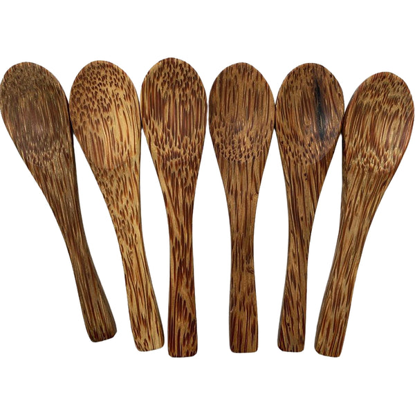 Set of six wooden spoons with a natural brown finish on a white background