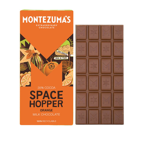 Montezuma's Space Hopper Orange Milk Chocolate bar packaging and chocolate bar on a white background
