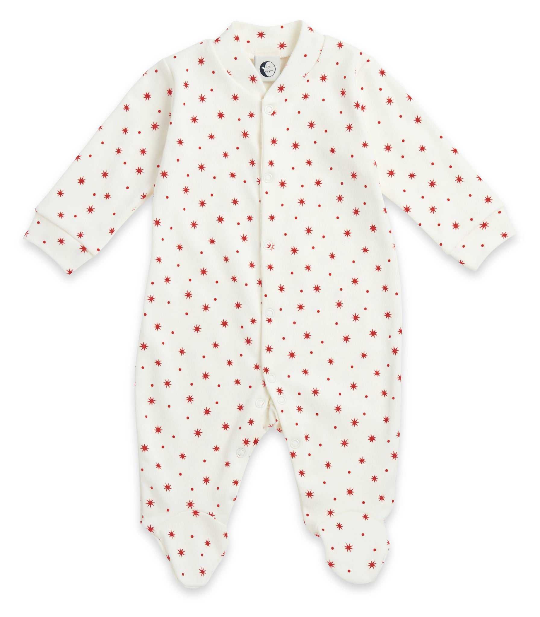 White baby onesie with red star and dot pattern on a white background