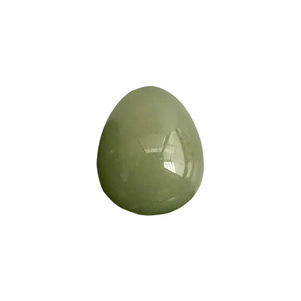 Green aventurine egg shaped gemstone against a white background