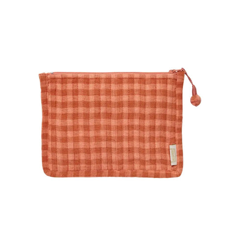 Plaid patterned pouch with a tassel on a white background