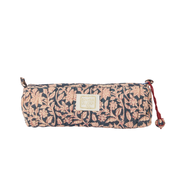 Floral patterned bag with a visible brand logo on a white background