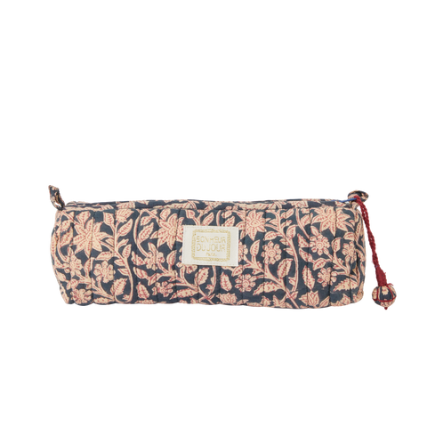 Floral patterned bag with a visible brand logo on a white background