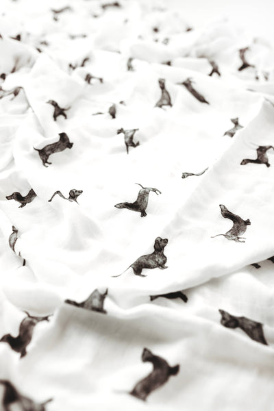 White fabric with black dachshund dog pattern