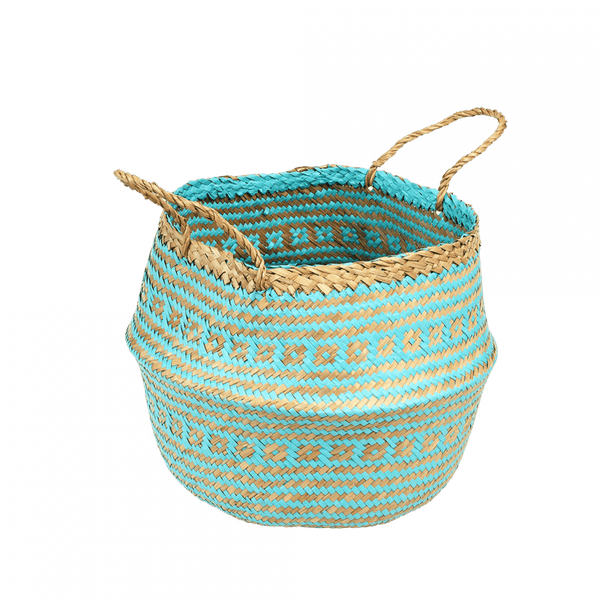 Woven basket with turquoise and beige pattern on a white background