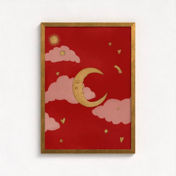Framed artwork with a gold crescent moon and pink clouds on a red background.