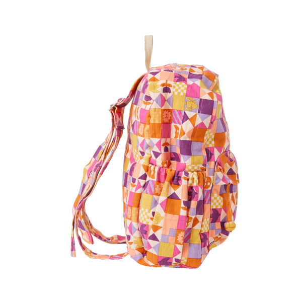 Colourful geometric-patterned backpack on a white background