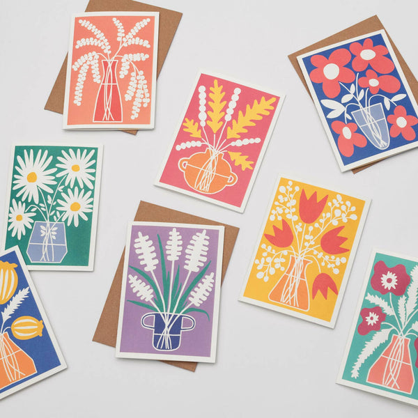 Set of colourful floral greeting cards on a white background
