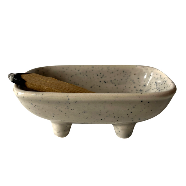Ceramic dish for burning smudge sticks and incense on a white background