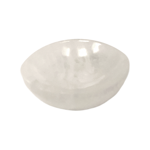White crystal bowl on a white background